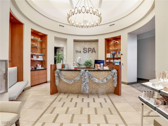 welcome area with a chandelier