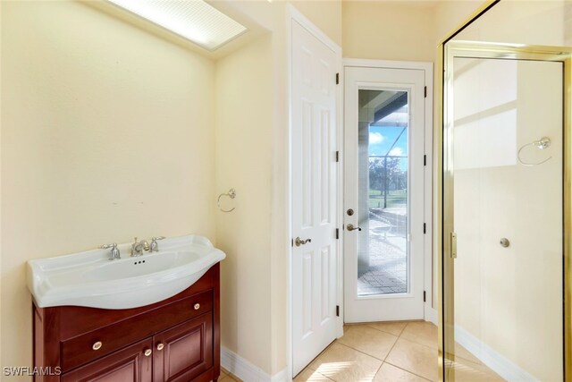 bathroom featuring vanity and tile patterned floors