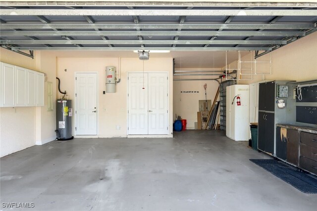 garage featuring water heater