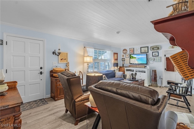 living room featuring wooden ceiling, light hardwood / wood-style floors, and ornamental molding