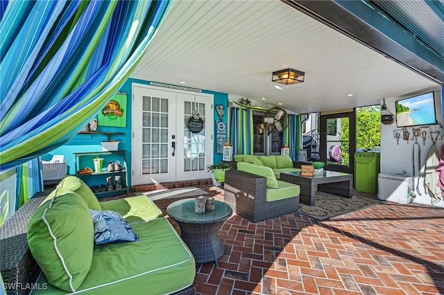 view of patio with outdoor lounge area and french doors