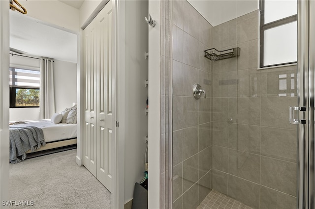 bathroom featuring an enclosed shower