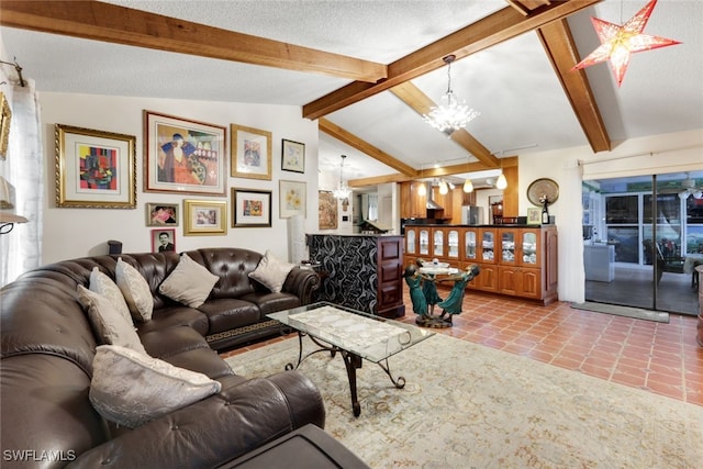 tiled living room with lofted ceiling with beams, a notable chandelier, and a textured ceiling