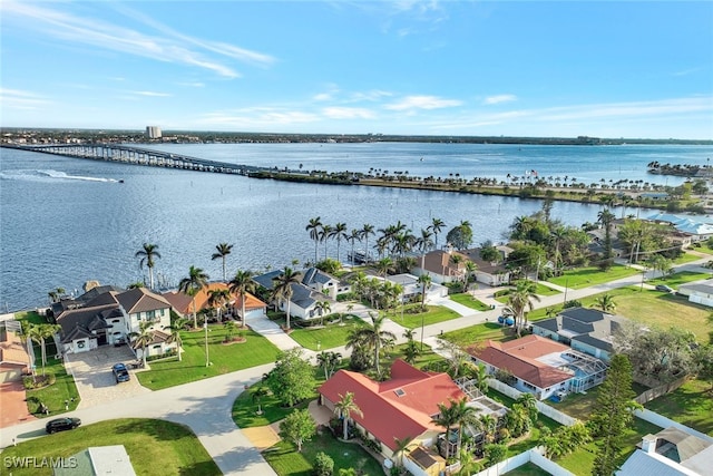 bird's eye view with a water view