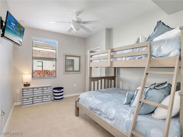 bedroom featuring ceiling fan and carpet floors