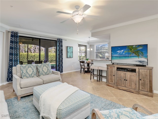 tiled living room with plenty of natural light, ceiling fan, and crown molding