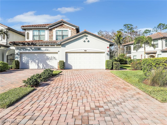 view of front of property featuring a garage