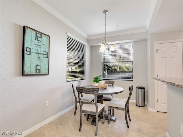 tiled dining room with crown molding, a healthy amount of sunlight, and a notable chandelier