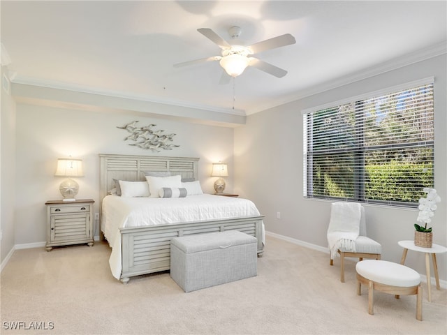 bedroom featuring light carpet, ceiling fan, and ornamental molding