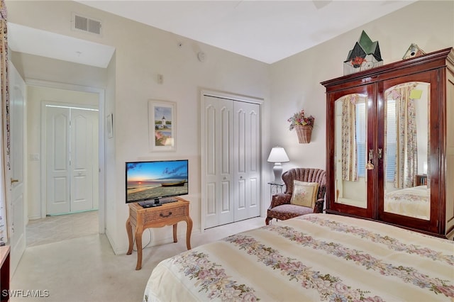 carpeted bedroom with french doors and a closet