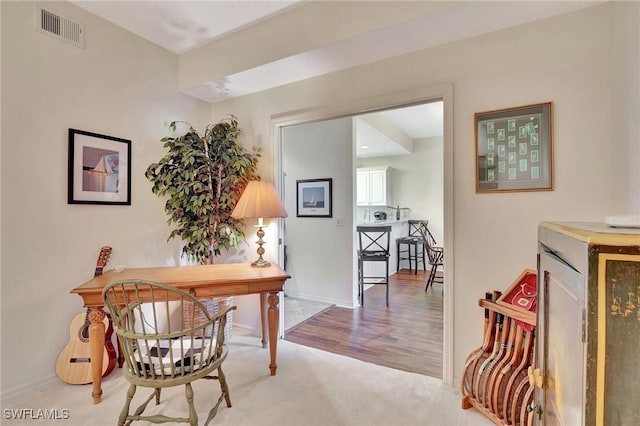 office space with hardwood / wood-style flooring