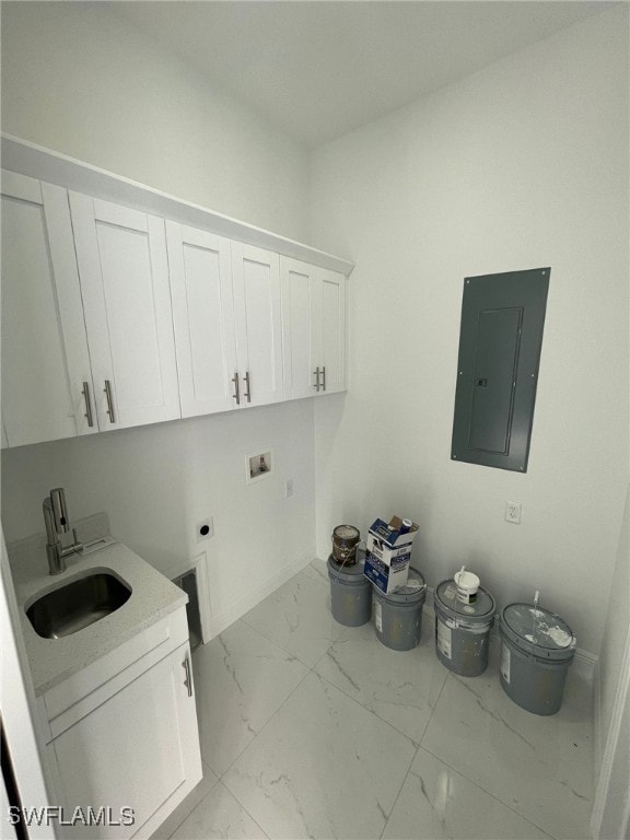 laundry room featuring sink, cabinets, washer hookup, electric panel, and electric dryer hookup