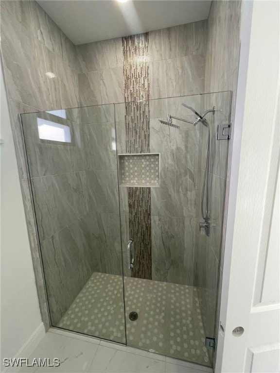 bathroom with an enclosed shower