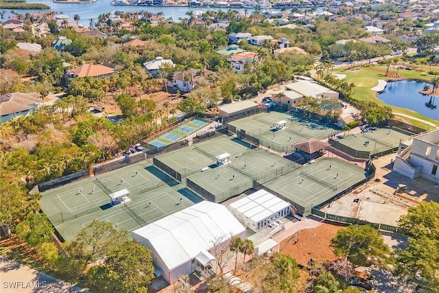 birds eye view of property featuring a water view