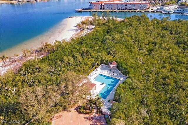 aerial view featuring a water view and a beach view