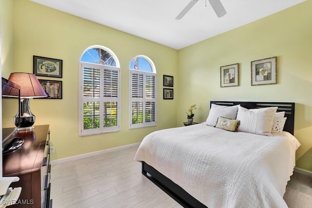 bedroom featuring ceiling fan and light hardwood / wood-style floors