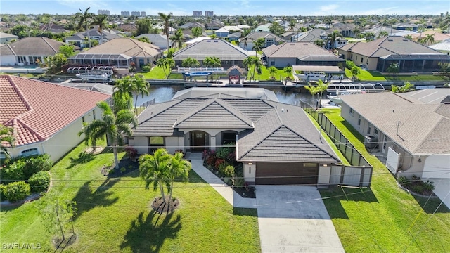 drone / aerial view featuring a water view