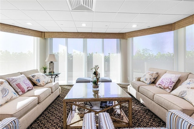 carpeted living room featuring a healthy amount of sunlight