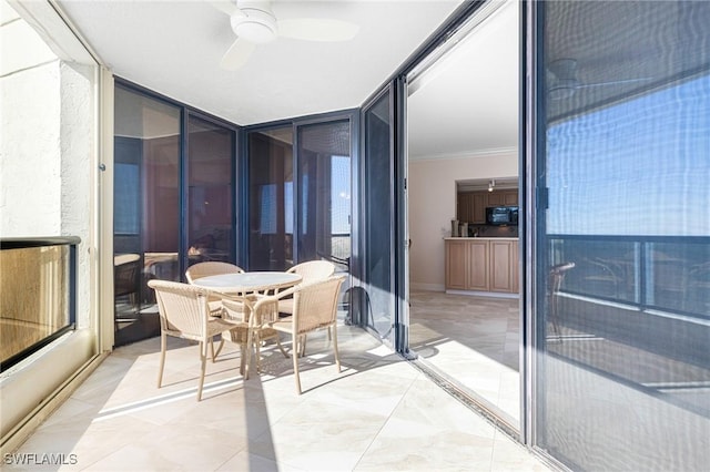 balcony featuring ceiling fan