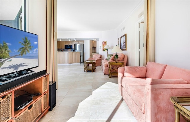 tiled living room featuring ornamental molding