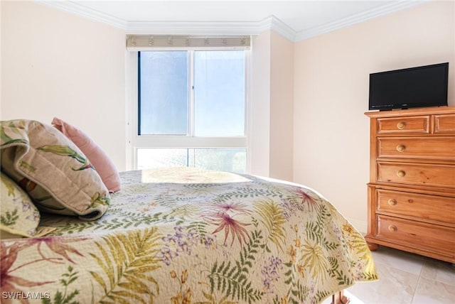 tiled bedroom featuring multiple windows and ornamental molding