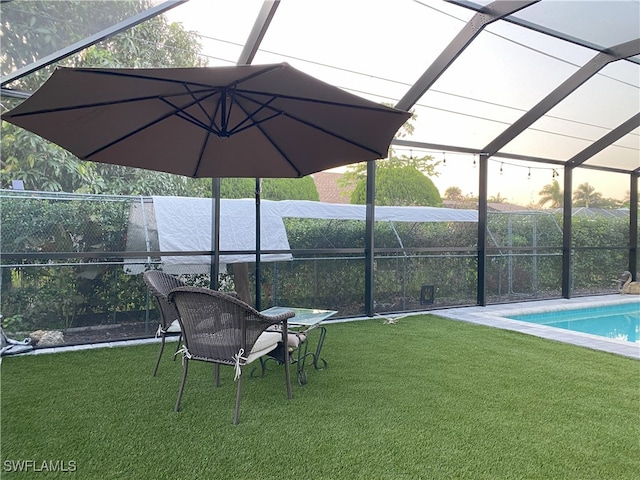 outdoor pool featuring a lanai and a yard