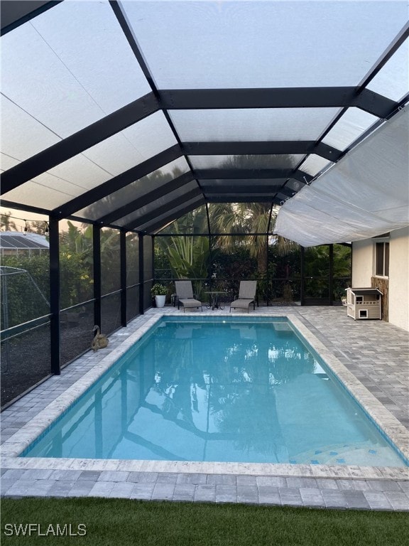 pool featuring a patio and a lanai