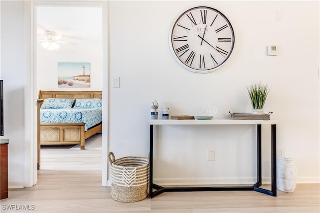 interior details with hardwood / wood-style flooring and ceiling fan