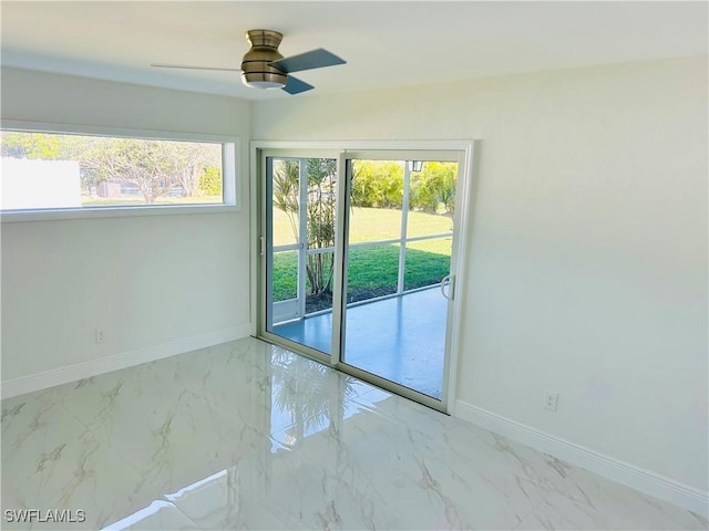 spare room featuring ceiling fan