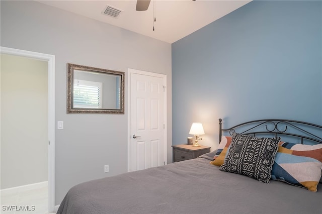 bedroom featuring ceiling fan and lofted ceiling