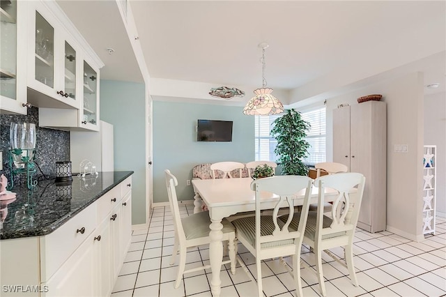 dining room with light tile patterned floors