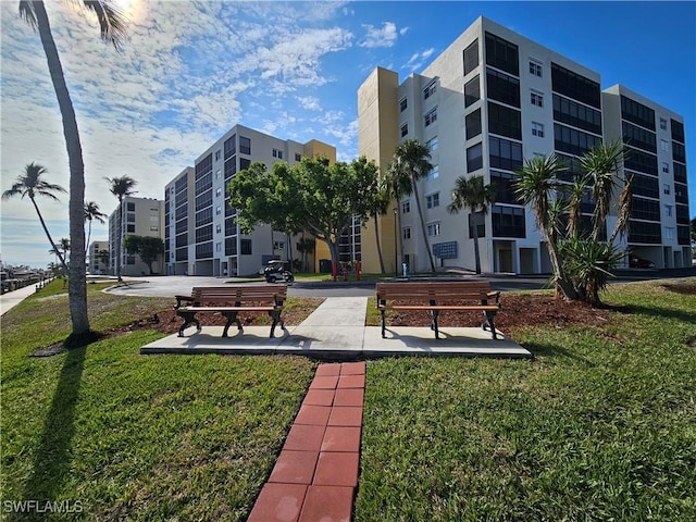 surrounding community featuring a lawn