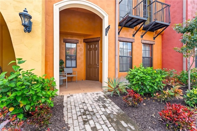 property entrance with a balcony