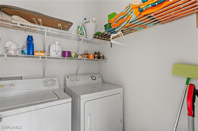 laundry area with washer and clothes dryer