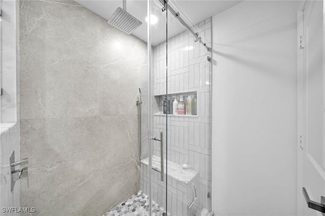 bathroom featuring walk in shower