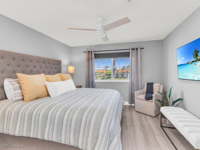 bedroom featuring ceiling fan and light wood-type flooring