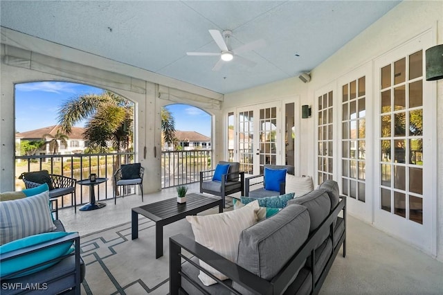 sunroom with ceiling fan and a healthy amount of sunlight