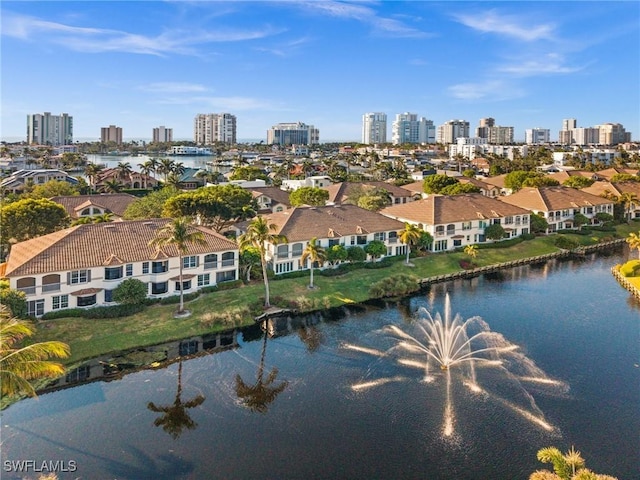 drone / aerial view with a water view