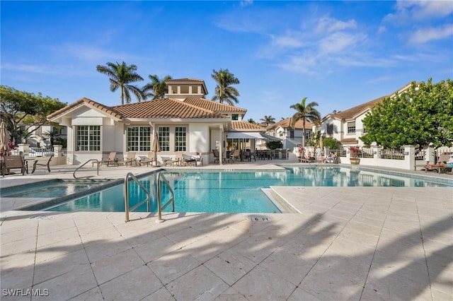 view of pool featuring a patio