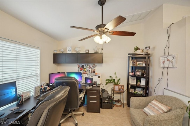 tiled home office with vaulted ceiling and ceiling fan