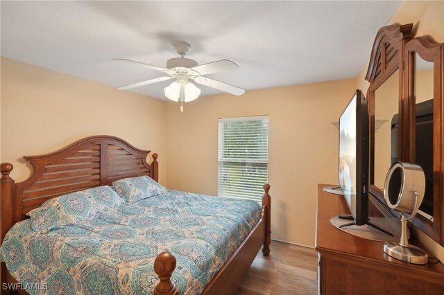 bedroom featuring ceiling fan and hardwood / wood-style floors