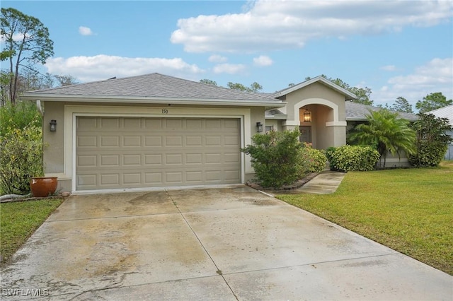 ranch-style house featuring a front yard and a garage