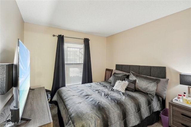 bedroom featuring carpet