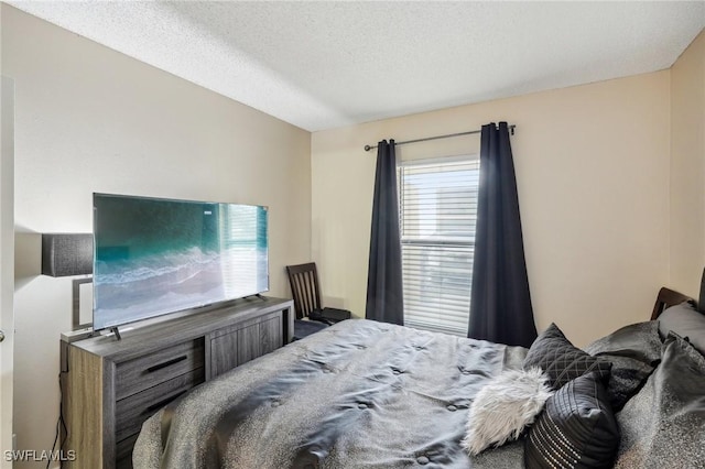 bedroom featuring a textured ceiling