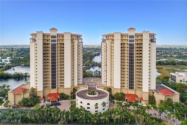 view of building exterior with a water view