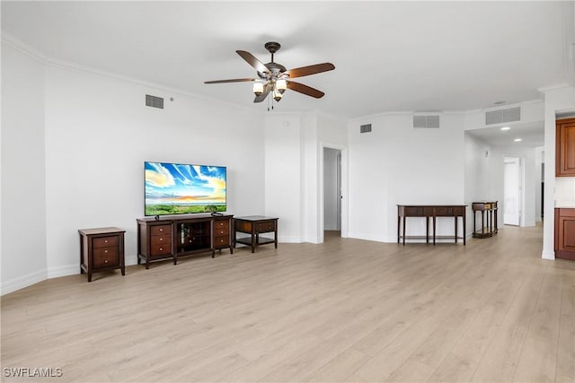 living room with ceiling fan, light wood-type flooring, and crown molding