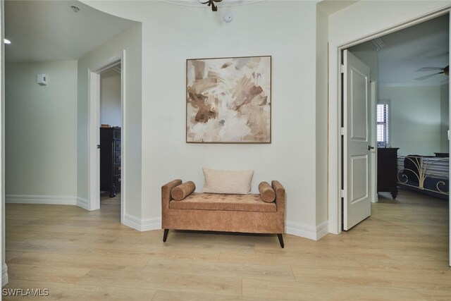 14300 Riva Del Lago Dr Unit 805, Fort Myers, FL 33907 - living area with baseboards, ceiling fan, and light wood-type flooring