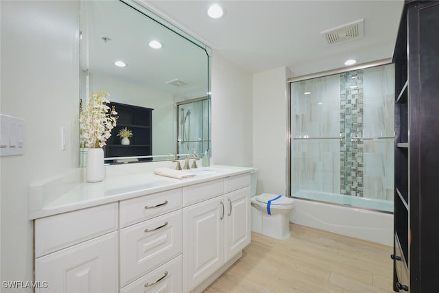 14300 Riva Del Lago Dr Unit 805, Fort Myers, FL 33907 - full bathroom with toilet, visible vents, wood finished floors, and recessed lighting