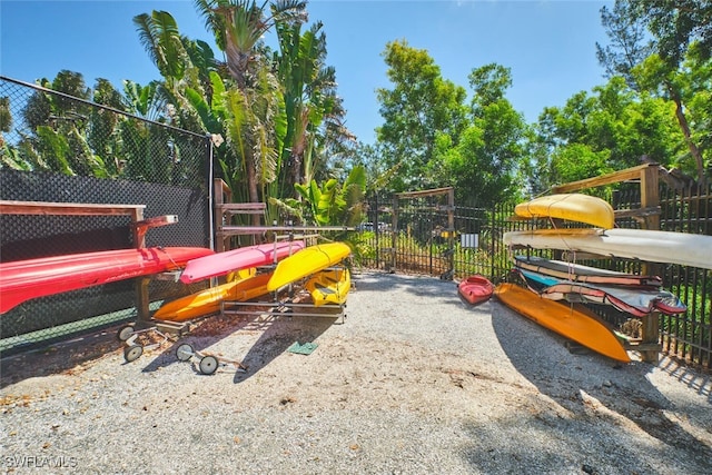 14300 Riva Del Lago Dr Unit 805, Fort Myers, FL 33907 - view of playground with a gate and fence