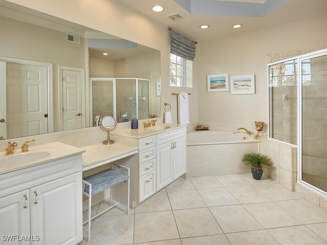 bathroom featuring vanity, crown molding, tile patterned flooring, and plus walk in shower